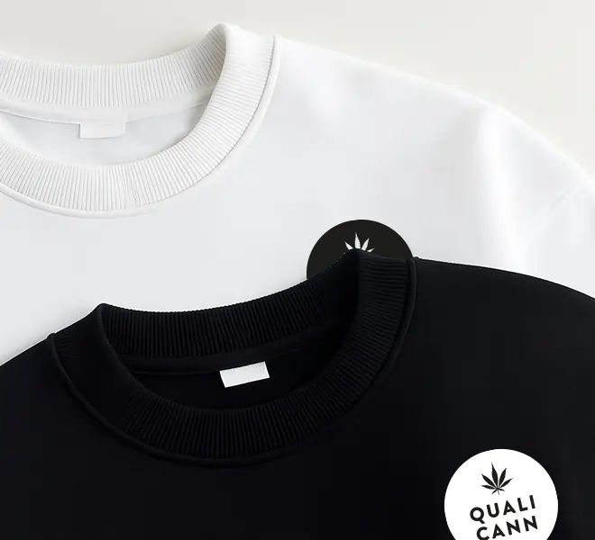 Schwarzer und weißer QUALICANN Sweater – minimalistisches CBD-Merchandise aus der Schweiz mit Cannabis-Logo