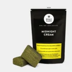 Midnight Cream CBD Hash von Qualicann mit Verpackung und Hash Stück